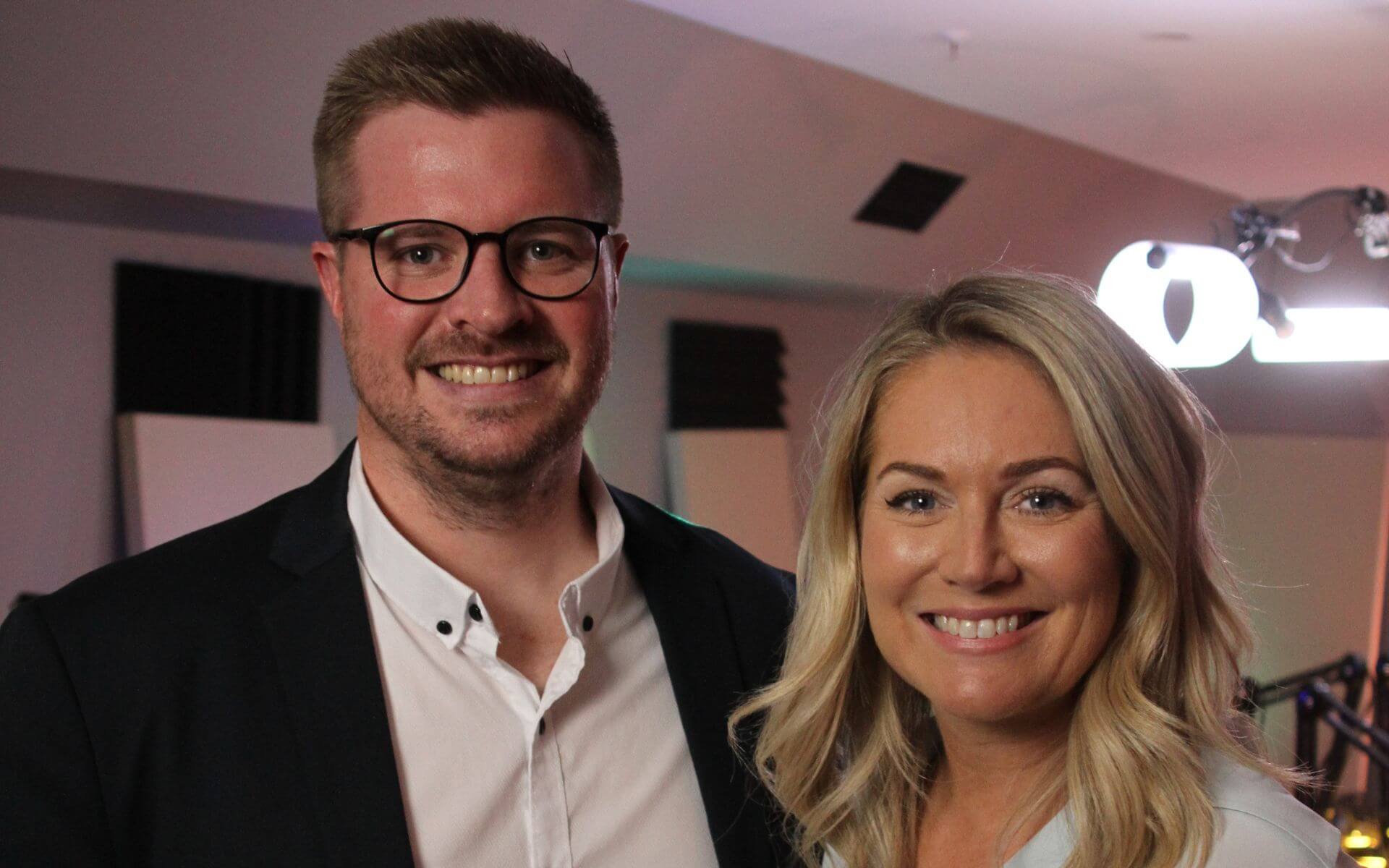 Tammy Barton and Shane Hatton on the set of a podcast MyMoney MyStory