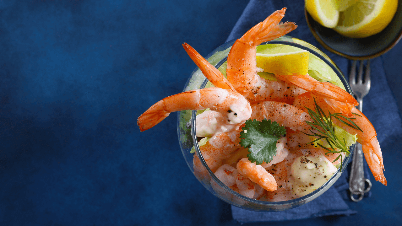 A close-up shot of a delicious prawn cocktail served in a glass, symbolising how smart budgeting can make festive indulgences like this affordable while staying on track financially.
