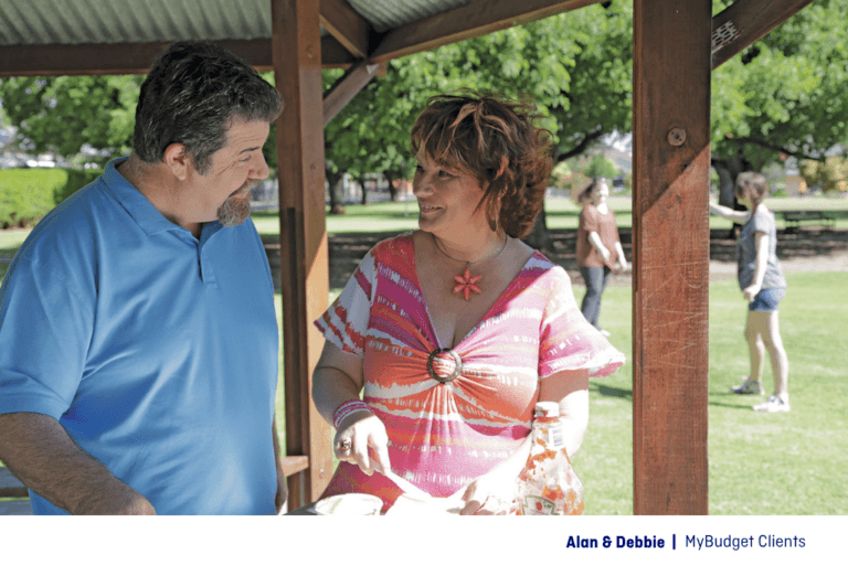 MyBudget clients Alan and Debbie enjoying time together after taking control of their finances with MyBudget.