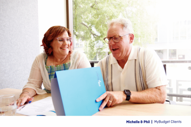 MyBudget clients Michelle and Phil discussing their budget plan at a free MyBudget appointment.