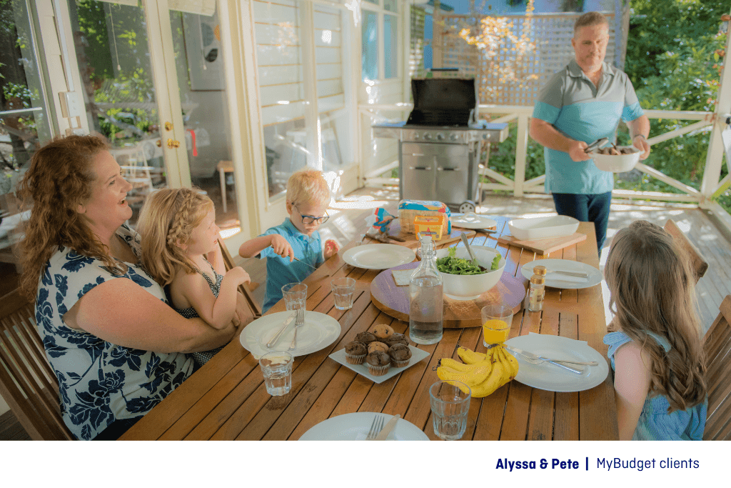 MyBudget clients Alyssa and Pete enjoying a relaxed Father’s Day lunch with their kids in Australia, celebrating with peace of mind knowing the day was already budgeted for