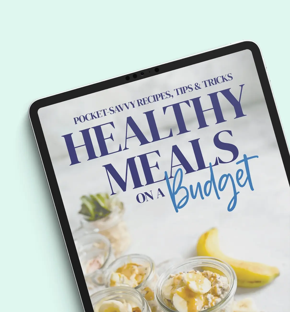 Tablet displaying MyBudget’s Healthy Meals on a Budget Guide for Australian families, created with Accredited Practising Dietitian Samantha Stuk (APD), to help save time and money in the kitchen.