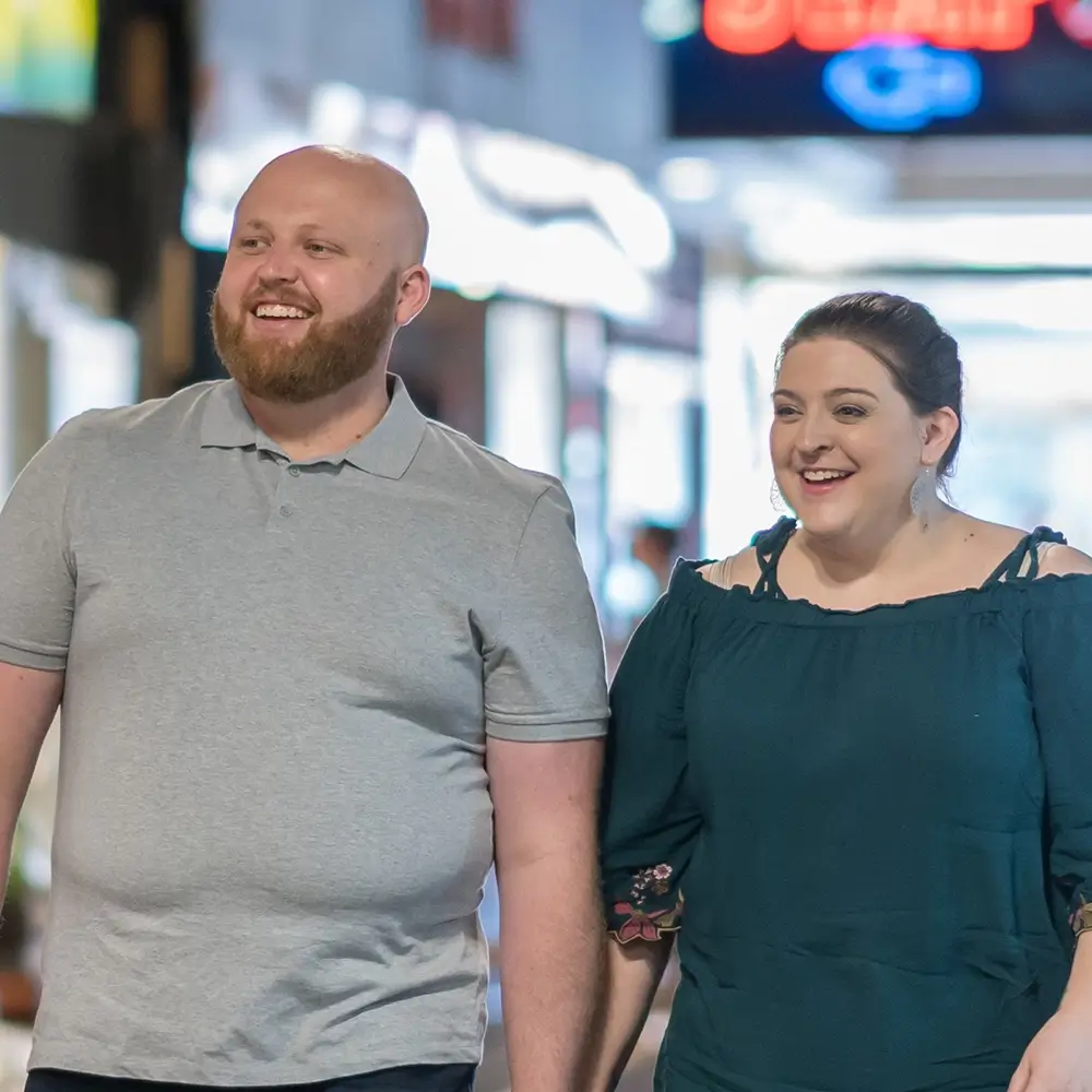 Megan and Creagh, MyBudget client's, learning budgeting skills to achieve their financial goals while shopping in Australia.