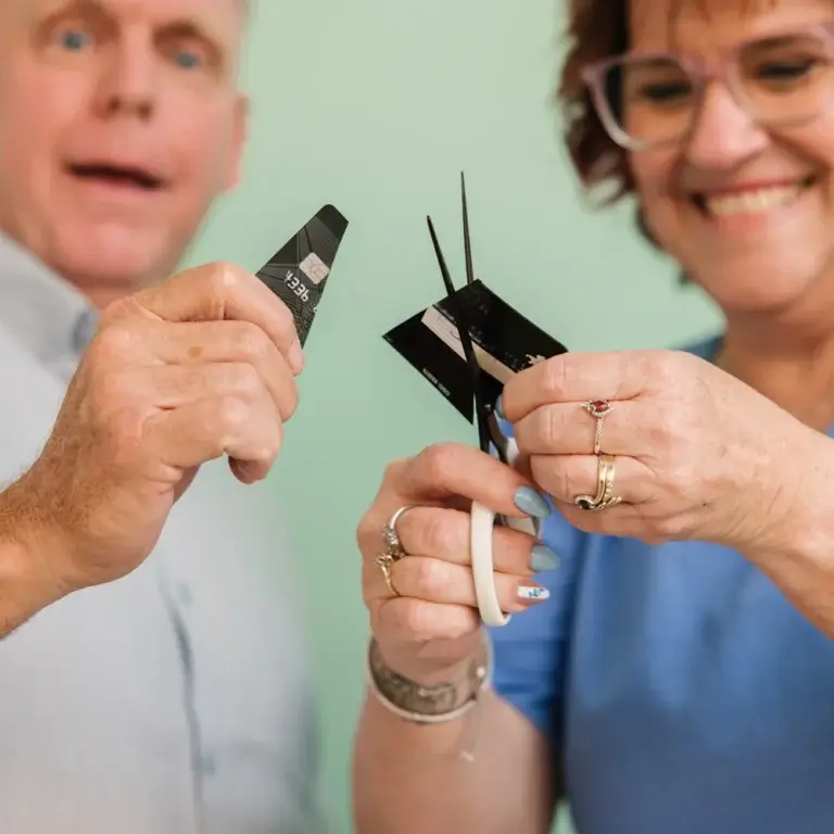 MyBudget clients Michelle and Phil pay off credit cards, find debt relief and financial freedom in Australia with a tailored personal budget.