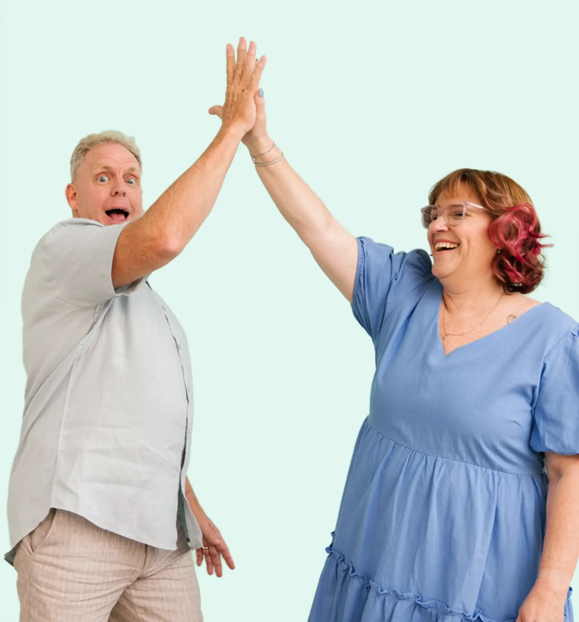 MyBudget clients Michelle & Phil celebrating and high-fiving as part of the Refer a Friend rewards program for Australians.