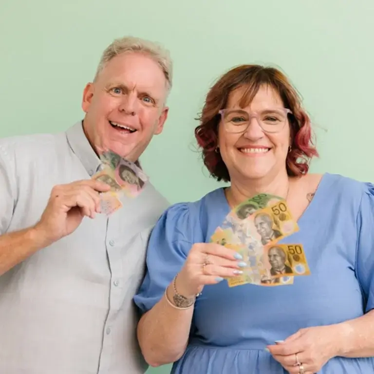 Michelle and Phil, MyBudget clients in Australia, achieving financial goals through budgeting help and a successful savings plan.