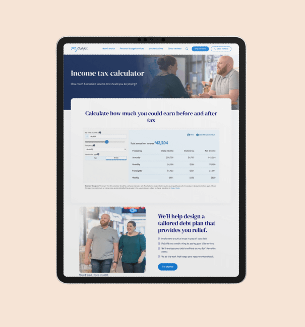Tablet device displaying the MyBudget Income Tax Calculator webpage, featuring the tax estimation tool and a section on tailored debt plans.
