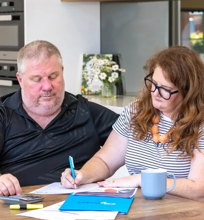 MyBudget clients Alyssa and Pete, a couple, organizing bills with a dedicated debt management plan and budget planning in Australia.