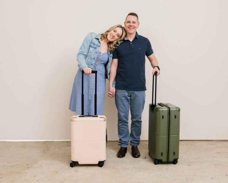 MyBudget clients Erin & Adam ready for their holiday, showing the result of saving with a clear budget and plan.