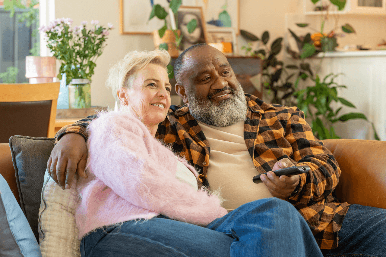 Kim and Bob relaxing together after taking control of their finances with MyBudget.