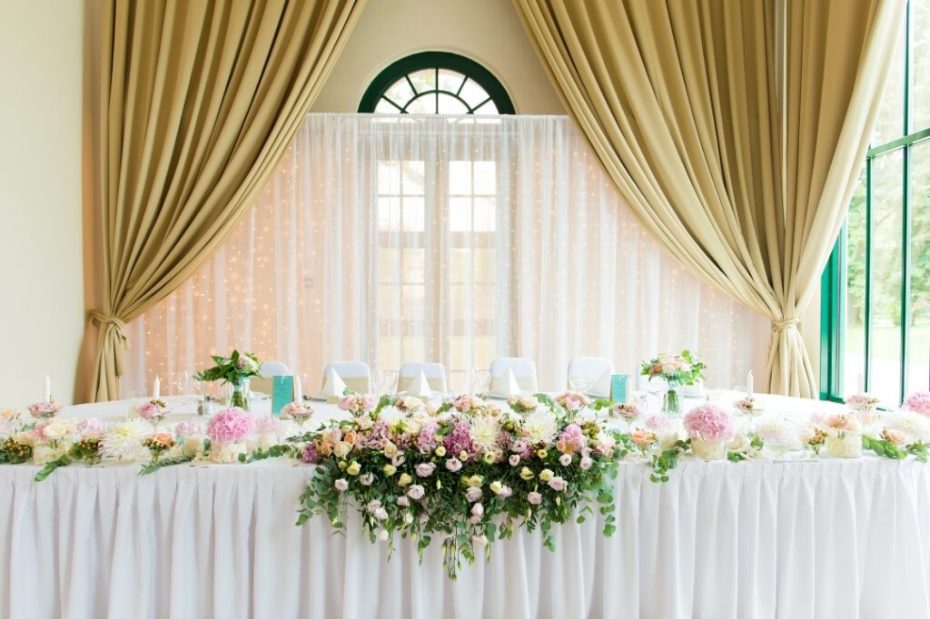 Bouquets on a wedding table - Affordable wedding savings tips - keeping wedding cost down and ways to save money on your wedding