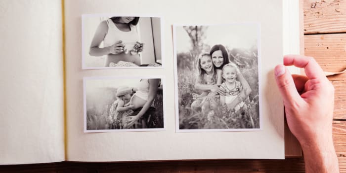 A photo album with a collage of pitcures with a mum and her kids - cheap mother's day gifts