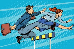 cartoon-style image of a male and female in suits jumping a hurdle