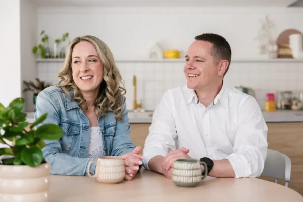 Erin and Adam, MyBudget clients save money by meal planning. They saved $70,000 for a house deposit.