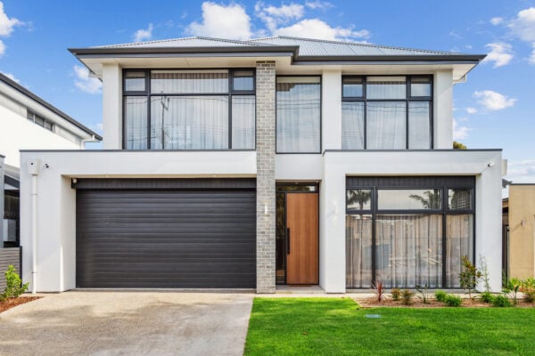 Modern coastal two-storey home in Australia, ideal for first home buyers using the Home Guarantee Scheme