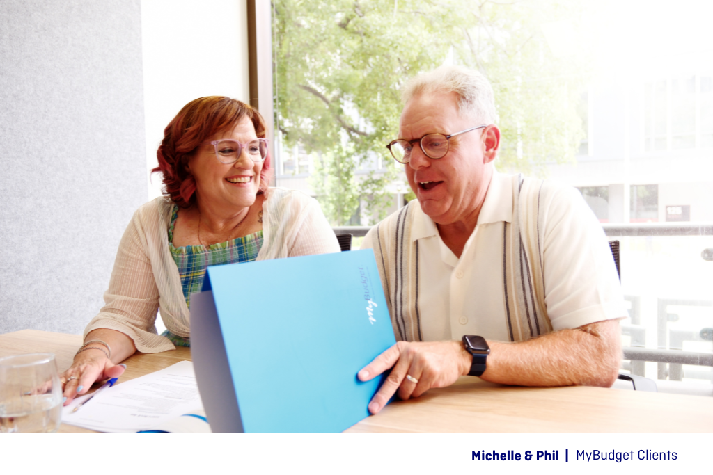 MyBudget clients Michelle and Phil discussing their budget plan at a free MyBudget appointment.