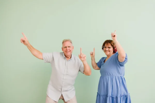 MyBudget clients Michelle and Phil celebrating paying off their house early in Australia with help from MyBudget’s expert support.